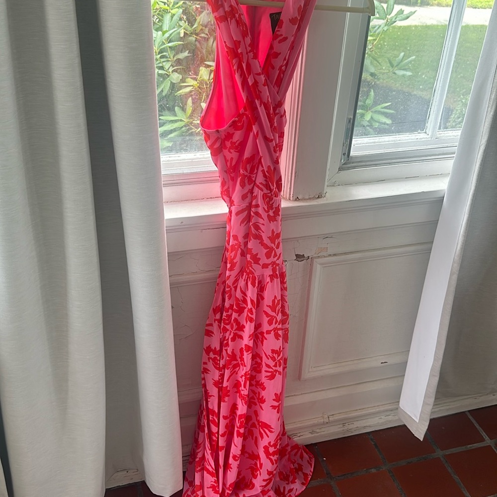 Pink and red long dress with criss cross style top.